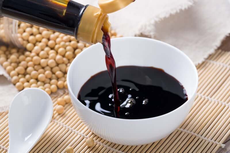 pouring-soy-sauce-into-a-white-bowl-800×533